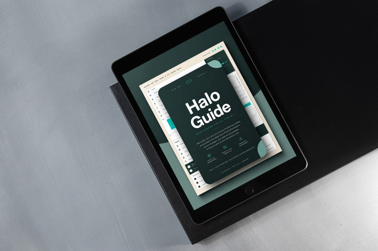 A tablet device angled on a dark surface, displaying a digital guide titled 'Halo Guide' with a dark teal and white design.
