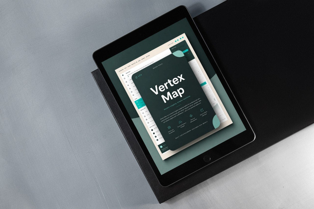 A tablet device angled on a dark surface, displaying a digital design template or book cover titled 'Vertex Map' with a dark teal and white layout.